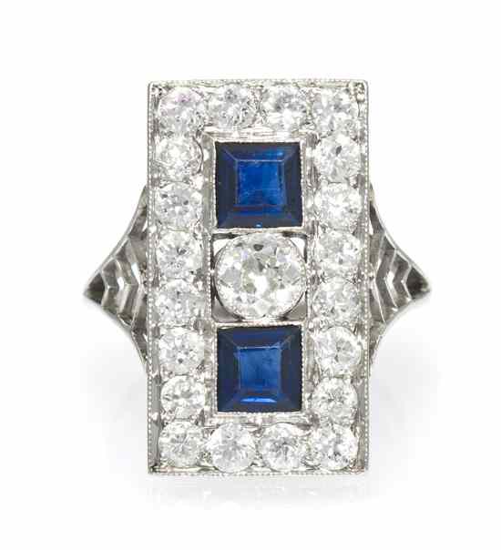 Appraisal: An Art Deco Platinum Diamond and Blue Sapphire Ring containing