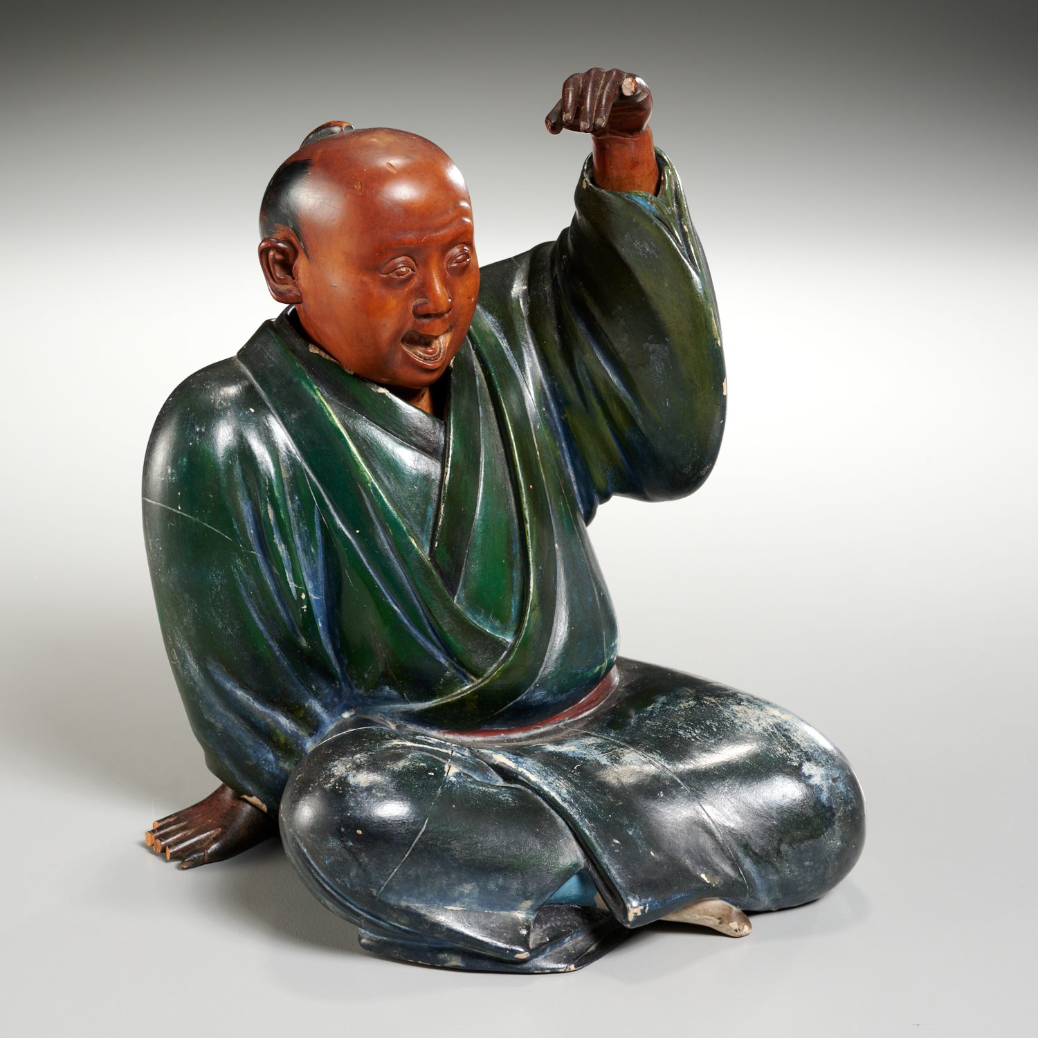 Appraisal: JAPANESE CARVED WOOD FIGURE OF A SEATED MONK th c