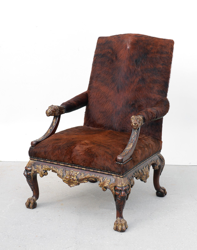 Appraisal: THEODORE ALEXANDER COW HIDE CARVED CHAIR Brown brindle cow hide