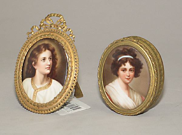 Appraisal: Two German oval porcelain and gilt bronze mounted miniature portrait