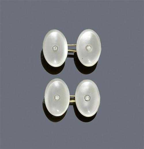 Appraisal: MOTHER-OF-PEARL AND DIAMOND CUFF LINKS ca Yellow gold and platinum