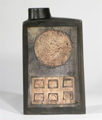 Appraisal: A Troika Pottery Chimney vase incised with sun and keypad