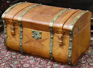 Appraisal: Victorian tooled leather trunk Victorian tooled leather trunk having a