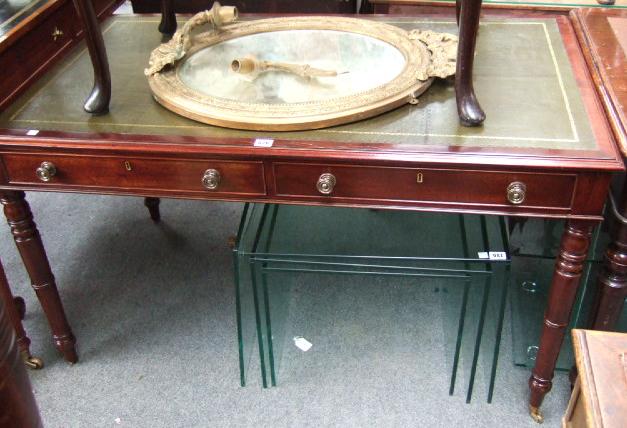 Appraisal: A th century mahogany writing table the green tooled leather