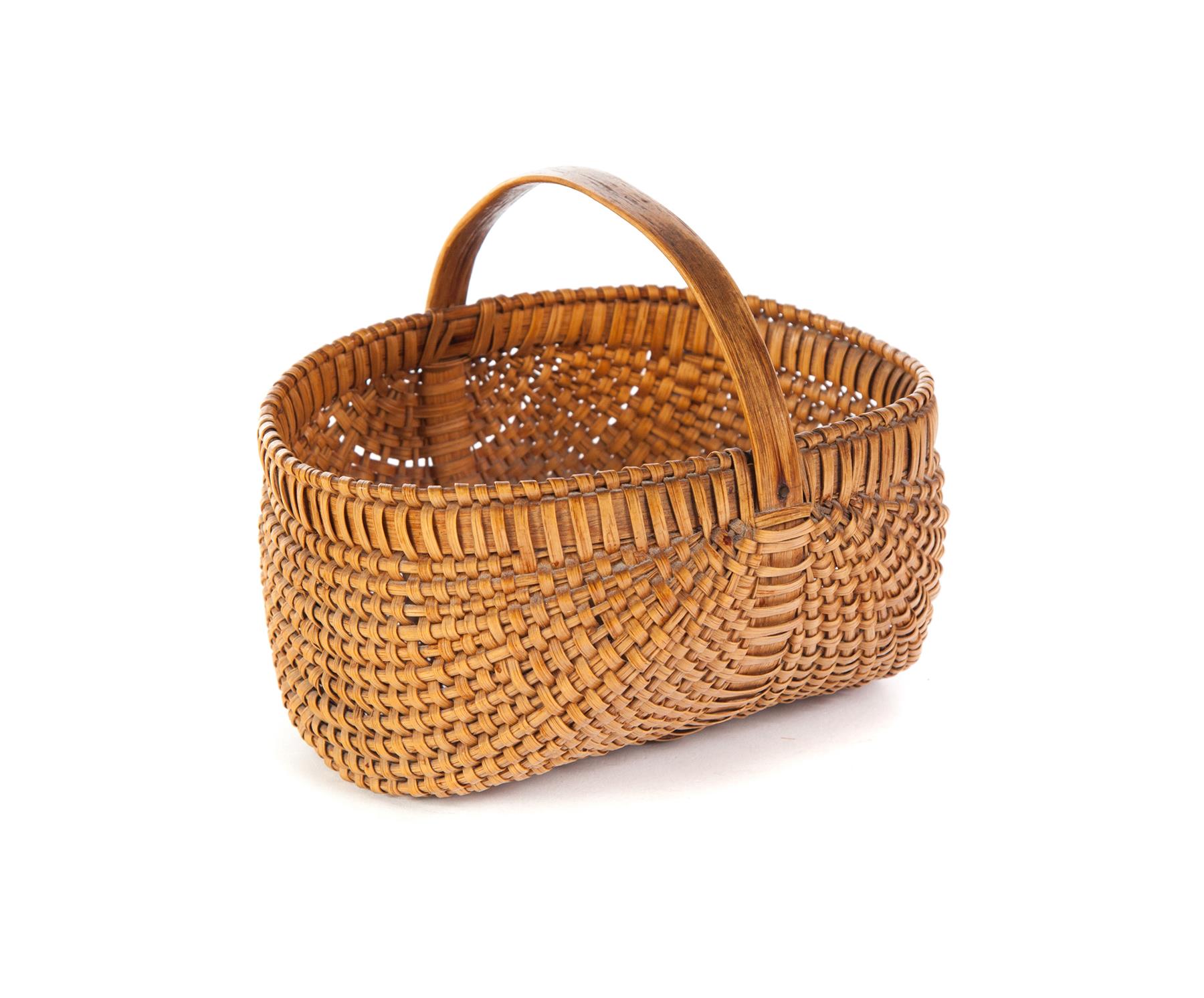 Appraisal: AMERICAN BUTTOCKS BASKET Late th century woven splint Bentwood handle