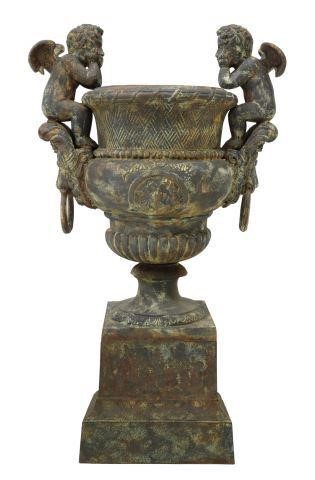 Appraisal: Large cast iron garden urn planter after the example designed