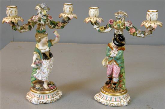 Appraisal: Pair of early twentieth century Dresden figural two branch candelabra