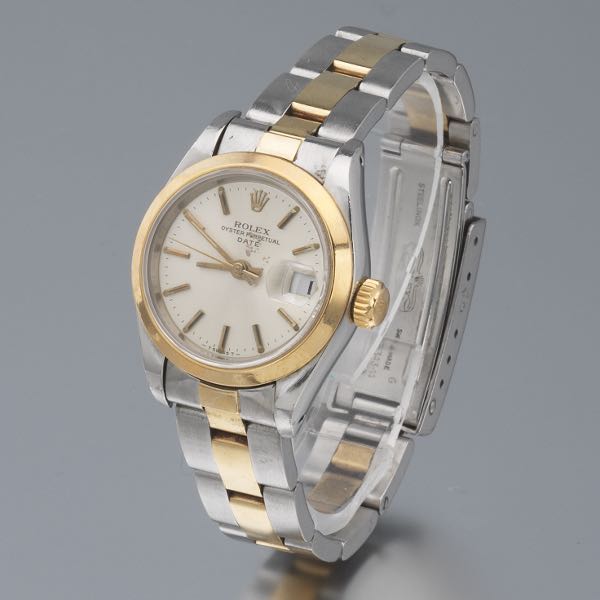 Appraisal: LADIES' ROLEX TUOTONE DATE will fit wrist Radial brushed champagne