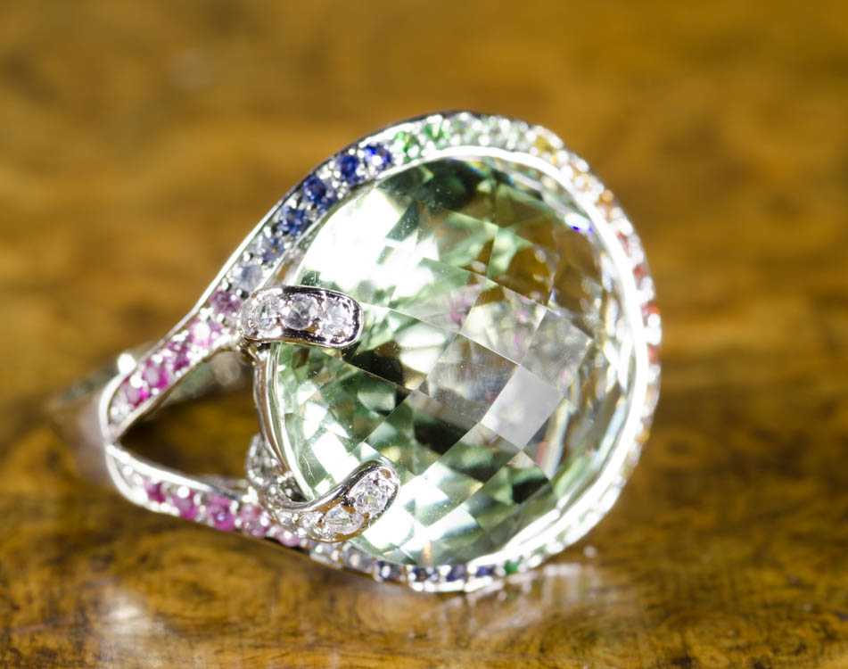 Appraisal: PRASIOLITE AND MULTI COLOR SAPPHIRE RING k white gold with