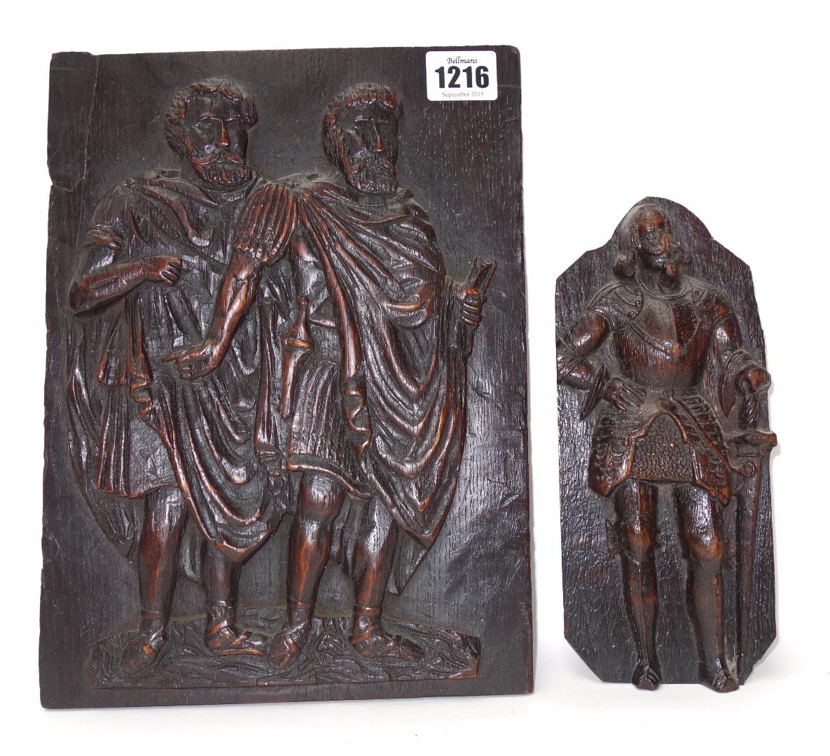 Appraisal: An th century oak panel relief carved with a pair