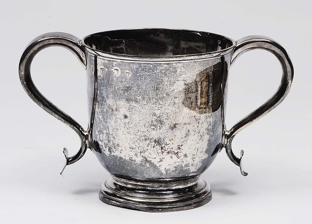 Appraisal: A Georgian silver two handled cupon pedestal foot monogrammed marks