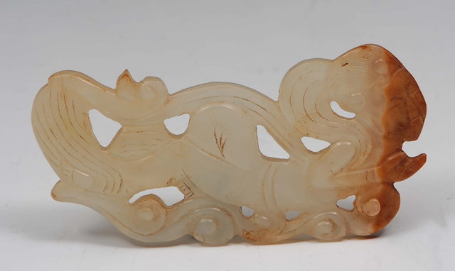 Appraisal: A Chinese white and russet jade carving th Centuryin the