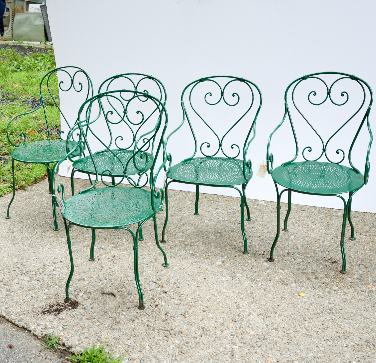 Appraisal: SET FRENCH WROUGHT IRON GARDEN CHAIRS c later green paint