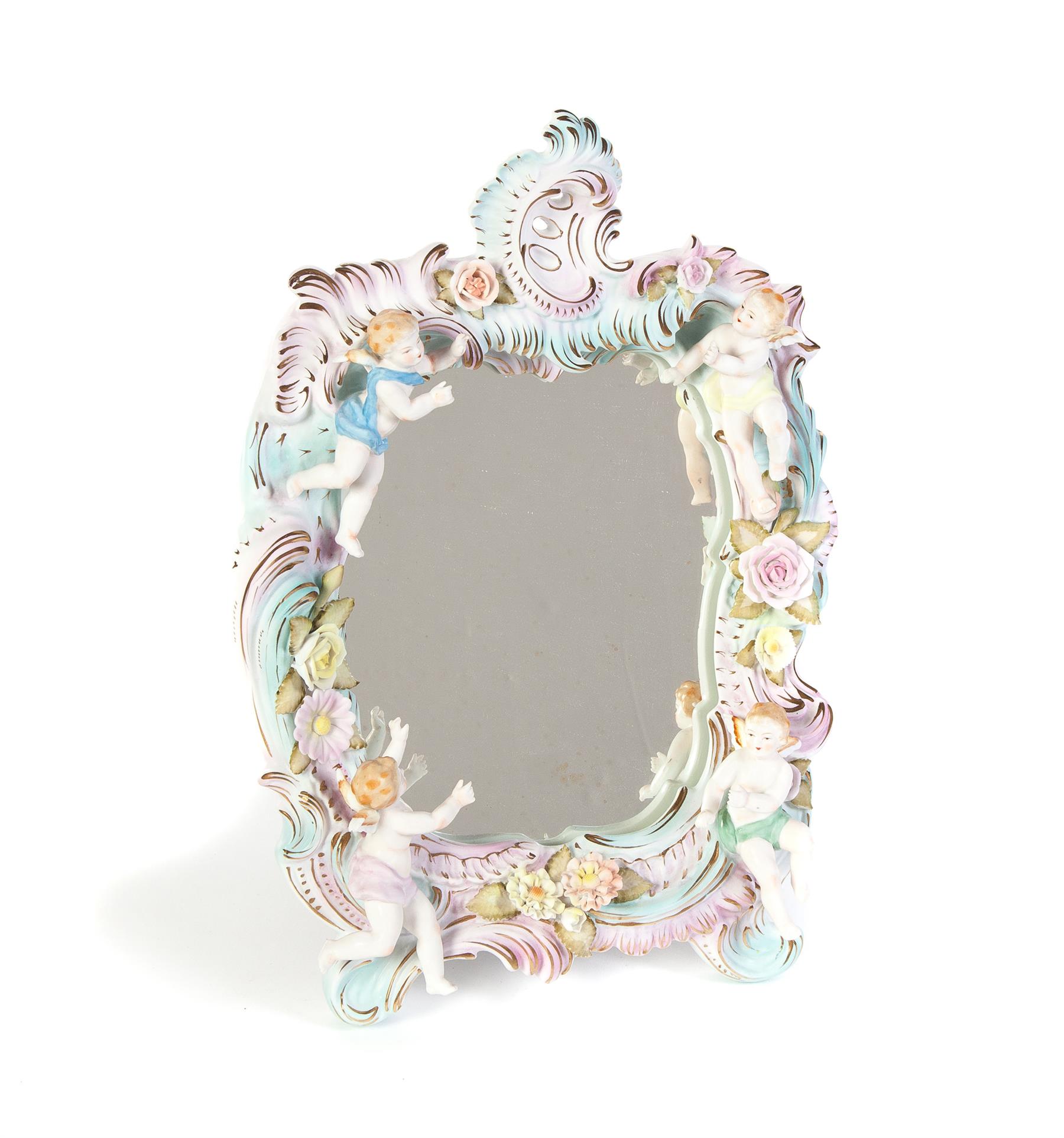 Appraisal: PORCELAIN TABLE TOP MIRROR European late th century Cherub and