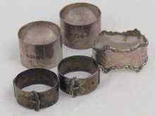 Appraisal: A mixed lot comprising three silver napkin rings one hallmarked