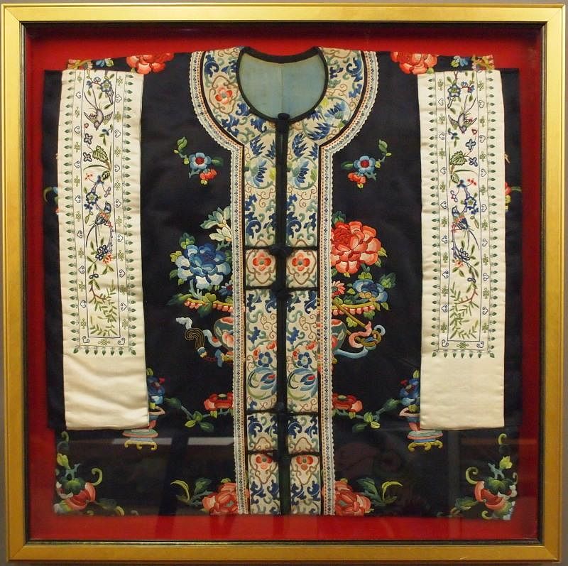 Appraisal: Chinese silk embroidery A circa Chinese silk robe displayed in