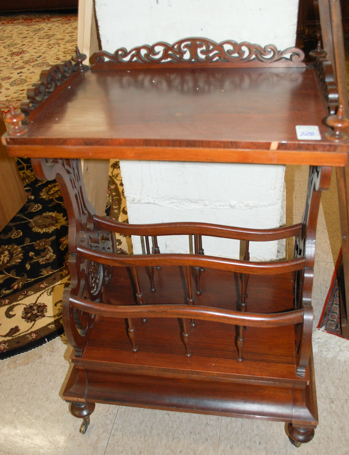 Appraisal: VICTORIAN ROSEWOOD CANTERBURY TABLE English th century having a rectangular