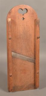 Appraisal: Pennsylvania th Century Walnut Slaw Board Heart and diamond cut