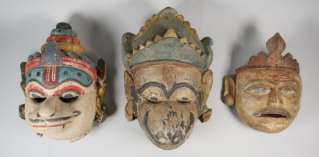 Appraisal: Three South Asian deity masks Carved wood and painted masks