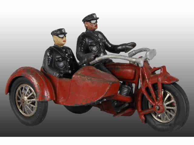 Appraisal: Cast Iron Two Cylinder Motorcycle and Sidecar Toy Description Red