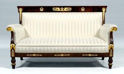 Appraisal: French Empire style settee parcel gilt with mahogany veneers and