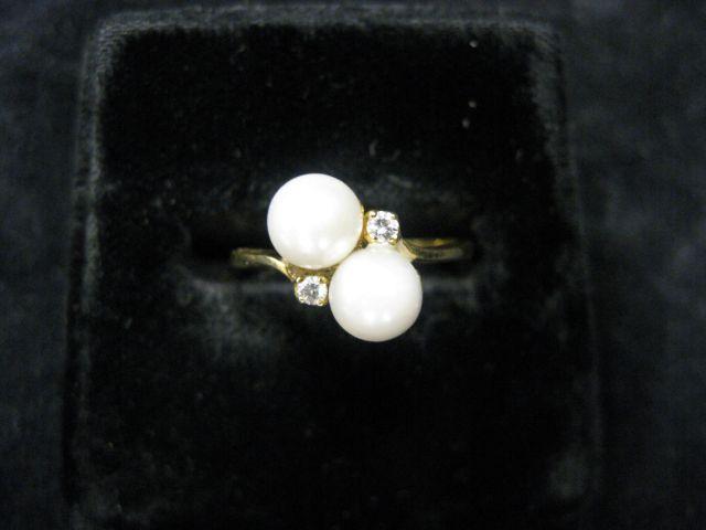 Appraisal: Pearl Diamond Ring two pearls and two diamonds in k