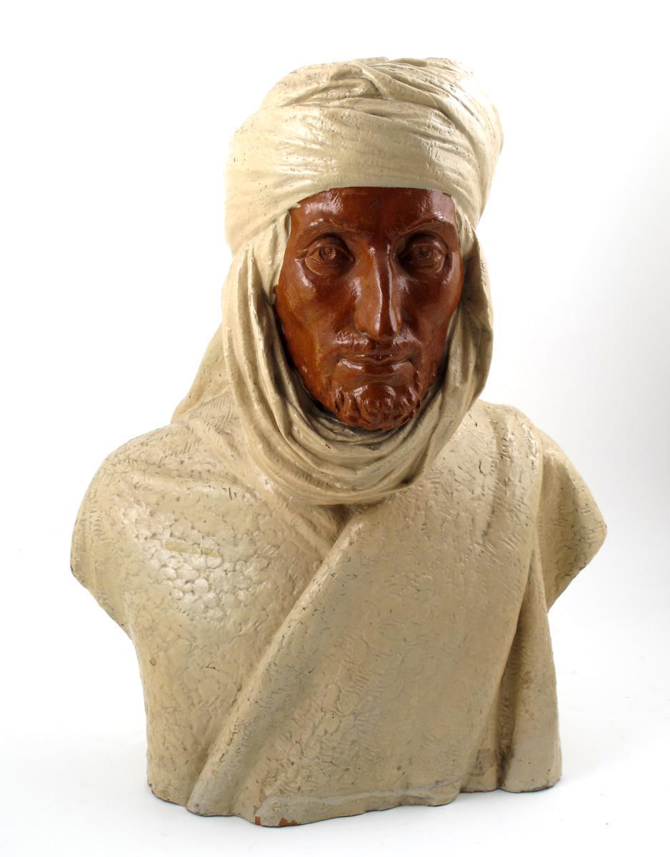 Appraisal: The Desert Sheik a large terracotta bust by Auguste Biaggi