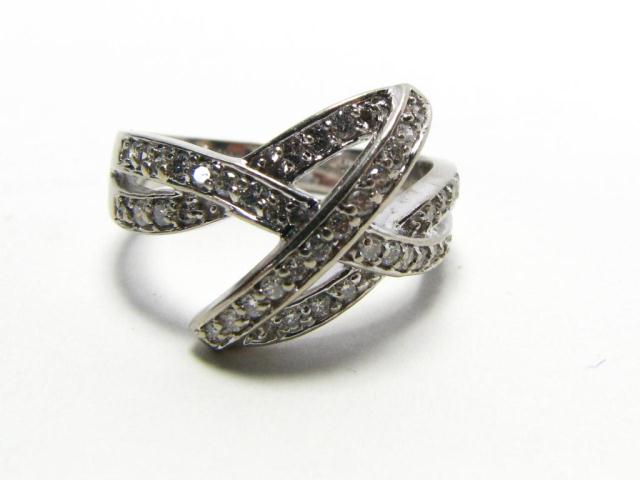 Appraisal: Lady's k white gold criss-cross style ring with round diamonds