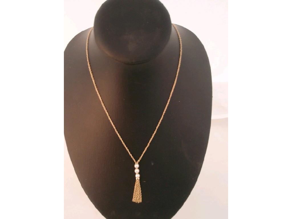 Appraisal: A ct gold pearl tassel pendant and chain g all