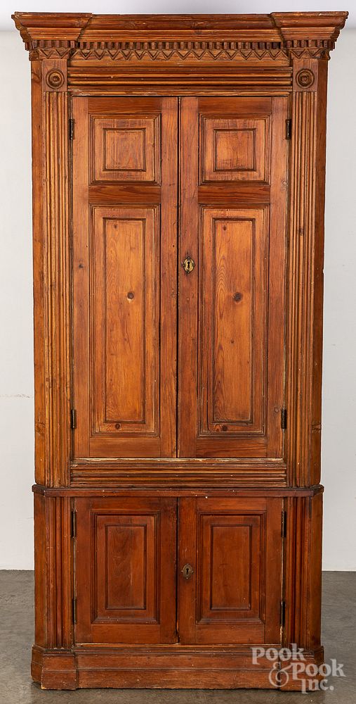 Appraisal: English pine two-part corner cupboard English pine two-part corner cupboard