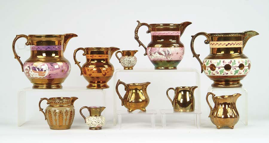 Appraisal: LOT OF TEN COPPER LUSTRE PITCHERS Two pitchers with pink