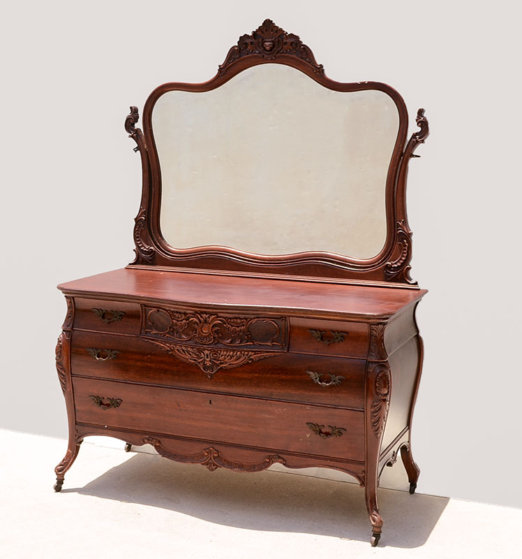 Appraisal: VICTORIAN CARVED MAHOGANY DRESSER WITH MIRROR Mirror with carved crest