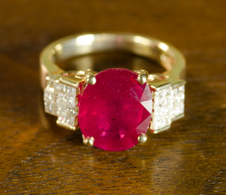 Appraisal: RUBY DIAMOND AND FOURTEEN KARAT GOLD RING with princess-cut diamonds