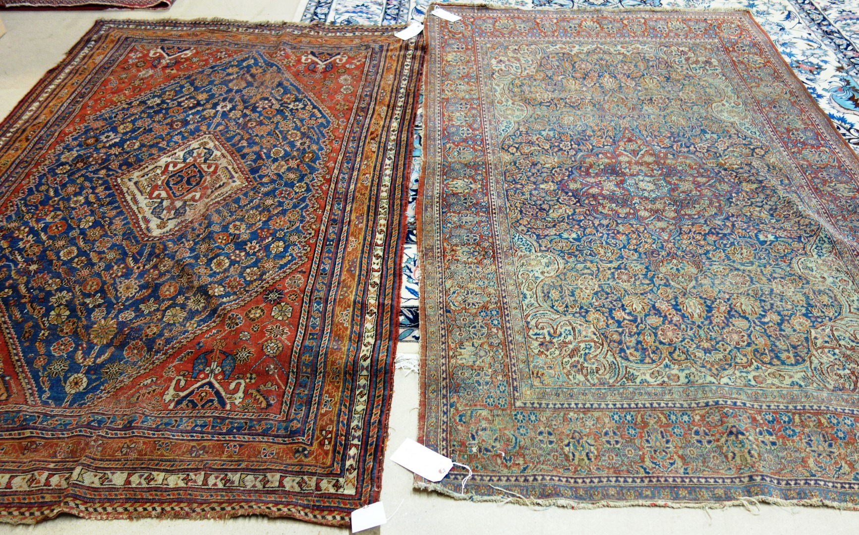 Appraisal: A Ghasghai rug Persian the indigo flower-filled field with an