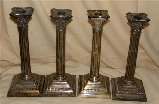 Appraisal: A SET OF FOUR CORINTHIAN COLUMN CANDLESTICKS - in high