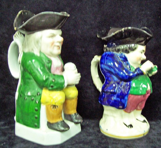 Appraisal: A Toby jug and cover cm high and another Toby