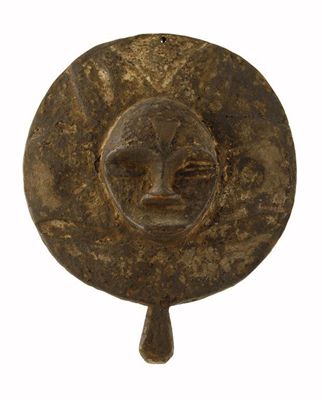 Appraisal: An Eket circular black maskette with white painted face having