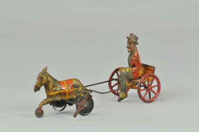 Appraisal: HAROLD LLOYD IN HORSE DRAWN CART Lithographed tin rare example