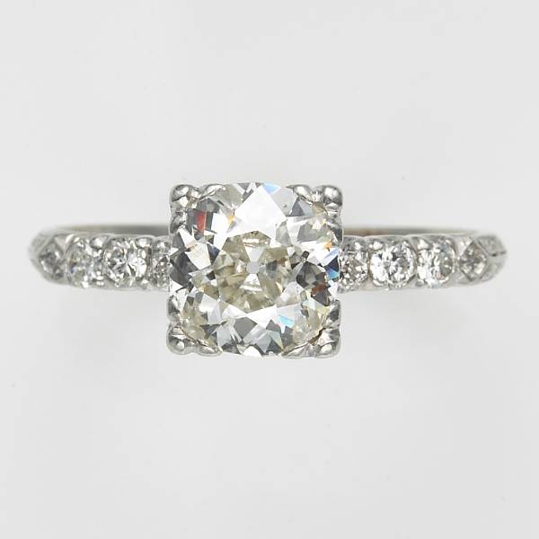 Appraisal: A diamond and platinum ring estimated central diamond weight carats