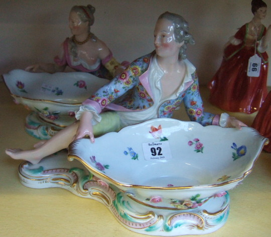 Appraisal: A pair of Meissen figural bon-bon dishes the dish formed