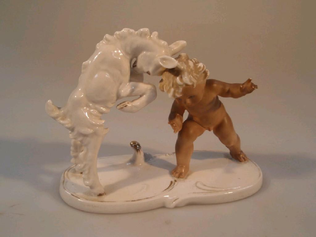 Appraisal: A continental porcelain figure group of a cherub jostling with