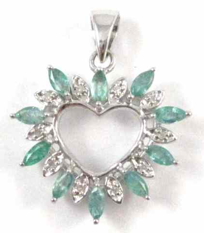 Appraisal: EMERALD AND DIAMOND HEART PENDANT the k white gold open