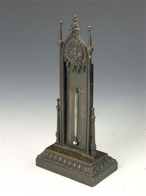 Appraisal: A Victorian bronze desk thermometer in gothic taste in cm