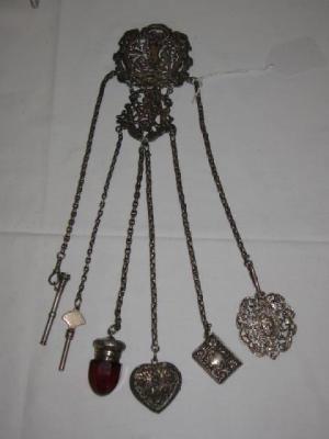 Appraisal: A VICTORIAN CHATELAINE'S BELT CLIP of circular form pierced and