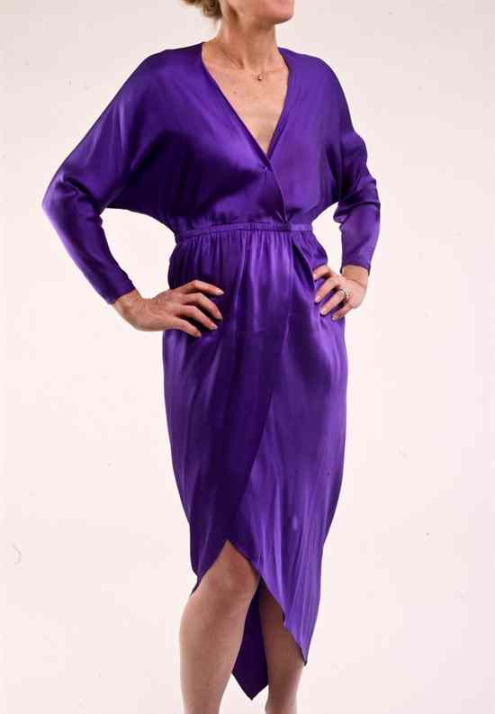 Appraisal: HALSTON PURPLE SILK WRAP DRESS s Three-quarter length sleeves cinched