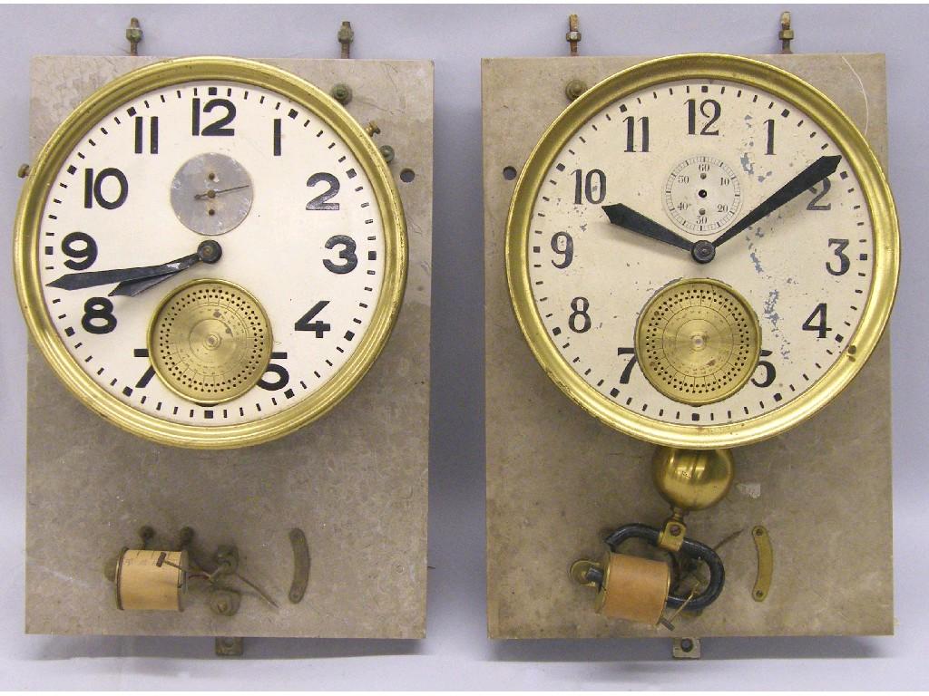 Appraisal: Two contemporary torsion clocks under plastic domes and upon spun