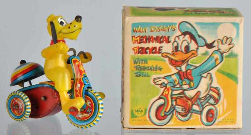 Appraisal: Tin Linemar Pluto Tricycle Wind-Up Toy Description Japanese Working Cycle