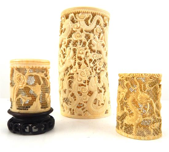 Appraisal: ASIAN Three antique intricately carved Chinese ivory cylinders the largest