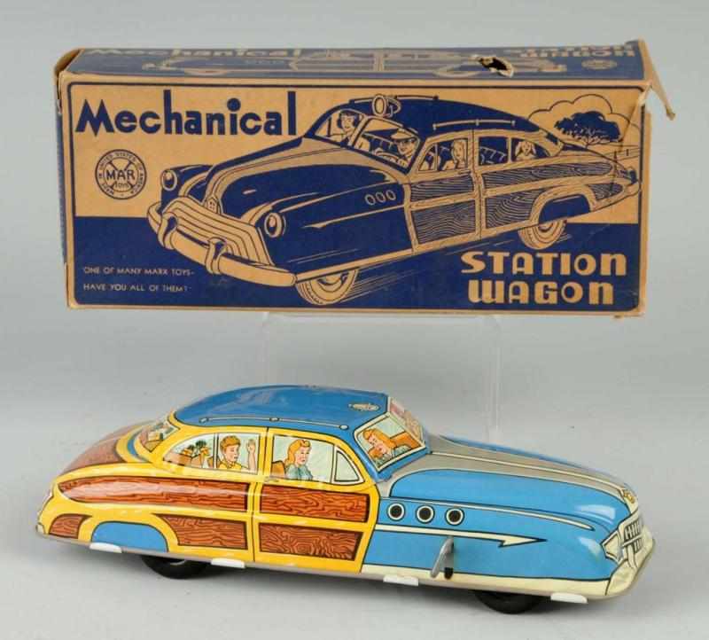 Appraisal: Tin Marx Station Wagon Wind-Up Toy Description American Working Woody