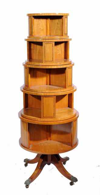 Appraisal: A SATINWOOD FIVE TIER CIRCULAR REVOLVING BOOKCASE of graduated form